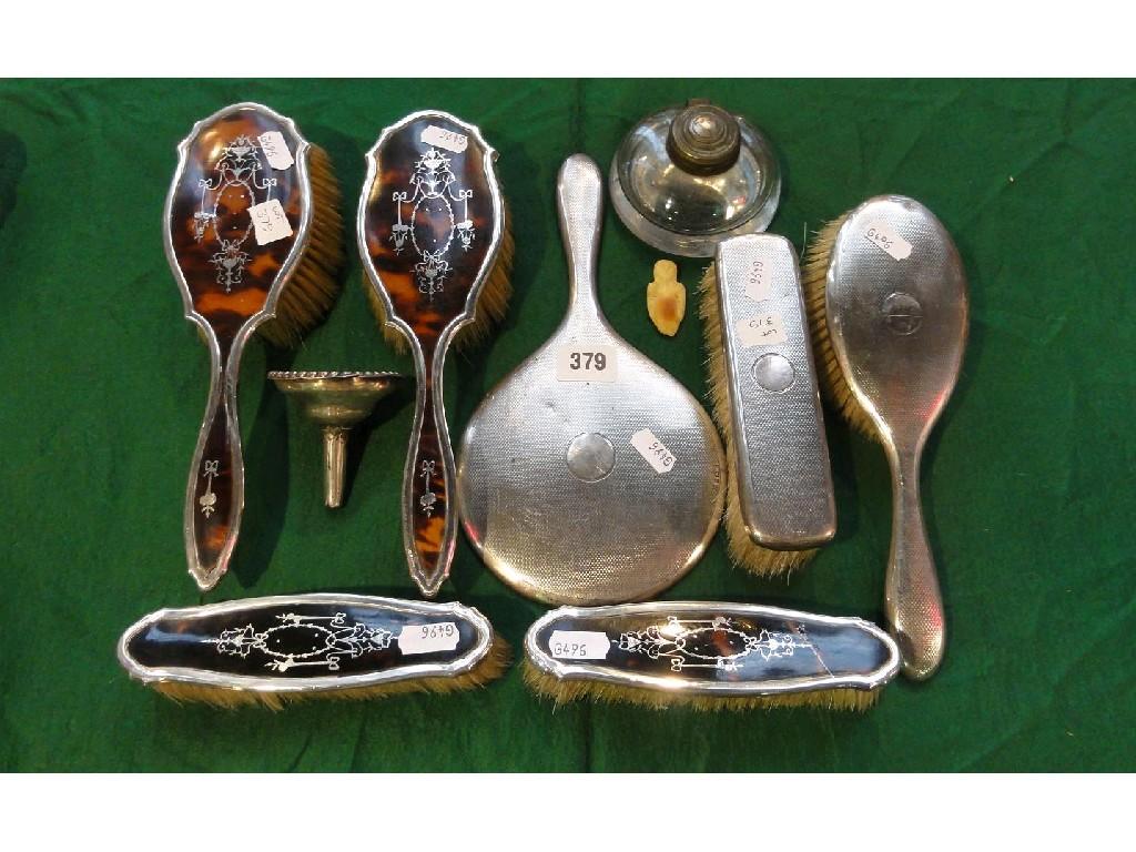 Appraisal: A collection of silver dressing tableware including tortoiseshell examples a