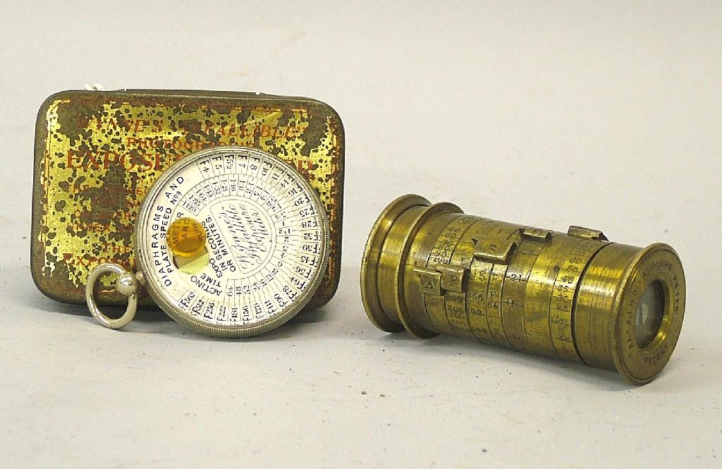 Appraisal: Watkins cylindrical brass patent exposure meter and a Wynne's 'Infallible'