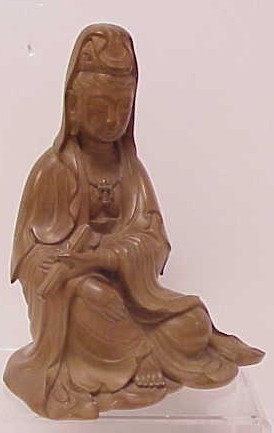 Appraisal: Chinese carve wood figure of Guanyin th C depicted seated