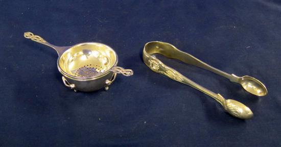 Appraisal: A Silver tea-strainer on stand Birmingham and a pair of