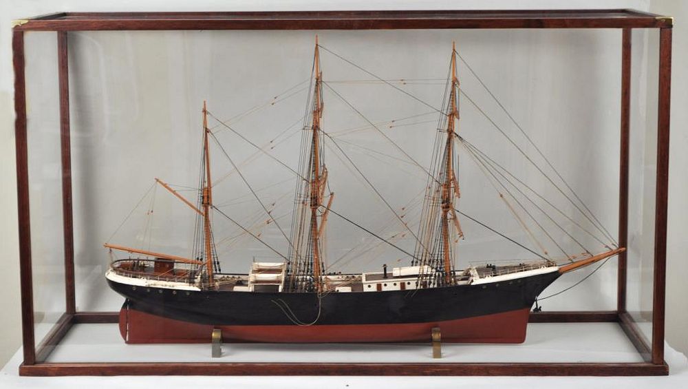 Appraisal: Cased Folk Art Clipper Ship Model carved and painted mounted