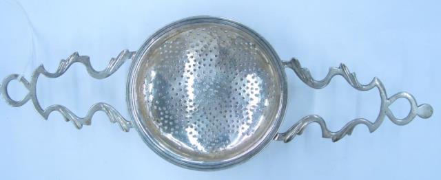 Appraisal: Antique silver plate punch strainer believed to be by Daniel