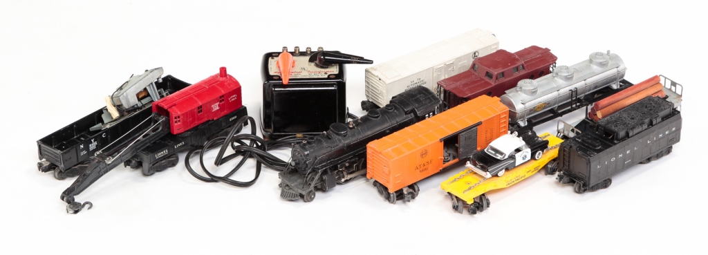 Appraisal: Second half th century Cast metal locomotive and plastic cars