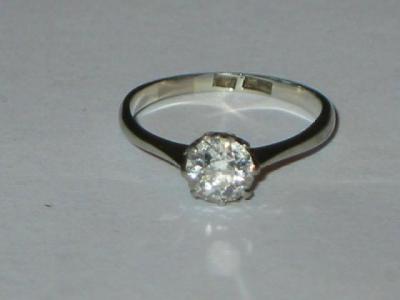 Appraisal: A SOLITAIRE DIAMOND RING the brilliant cut stone approximately cts