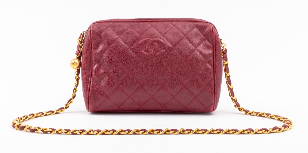 Appraisal: VINTAGE CHANEL BURGUNDY QUILTED LEATHER BAG Vintage Chanel burgundy quilted