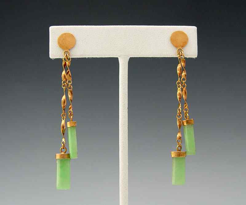 Appraisal: K JADE EARRINGS K yellow gold dangle earrings contain four