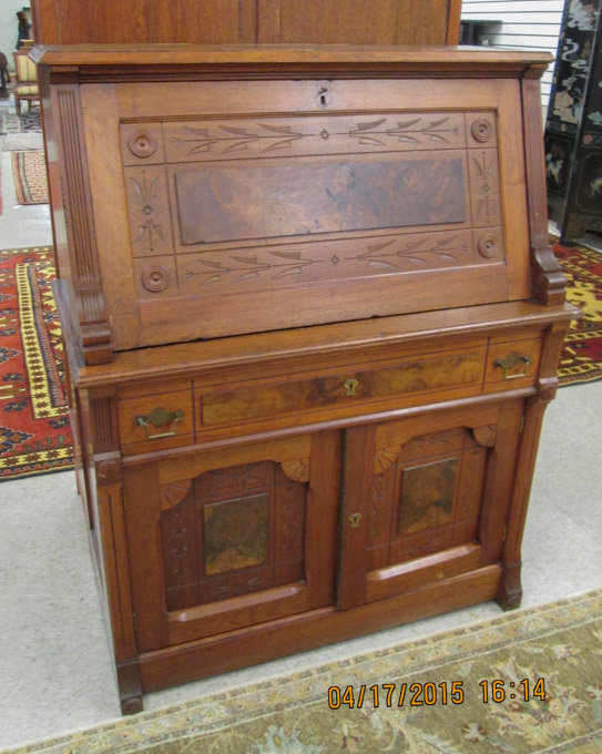 Appraisal: A VICTORIAN WALNUT DROP-FRONT SECRETARY Charles Eastlake design American c