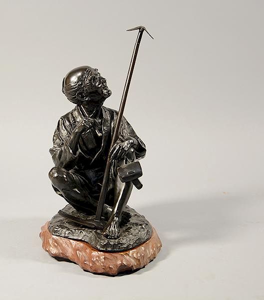 Appraisal: Japanese Meiji period bronze old man smoking opium pipe Japanese