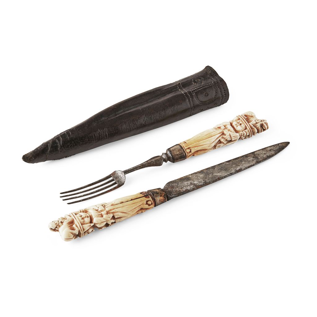 Appraisal: YIVORY AND STEEL KNIFE AND FORK SET POSSIBLY SCANDINAVIAN TH