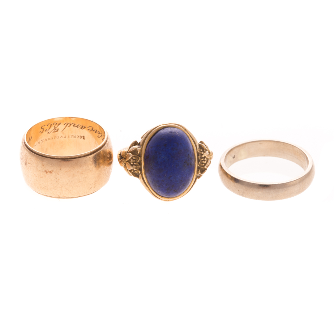 Appraisal: A Pair of Gold Wedding Bands and Lapis Ring K