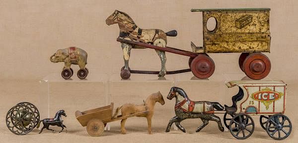 Appraisal: Four horse drawn toys to include a Gong Bell an