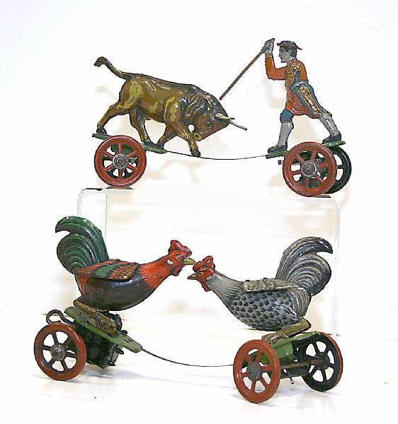 Appraisal: Nifty Articulating Toys Two clockwork German toys by Nifty including