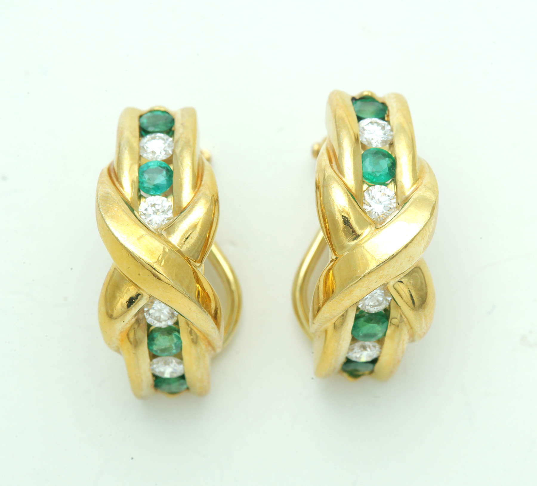 Appraisal: EMERALD AND DIAMOND EARRINGS European th century k yellow gold