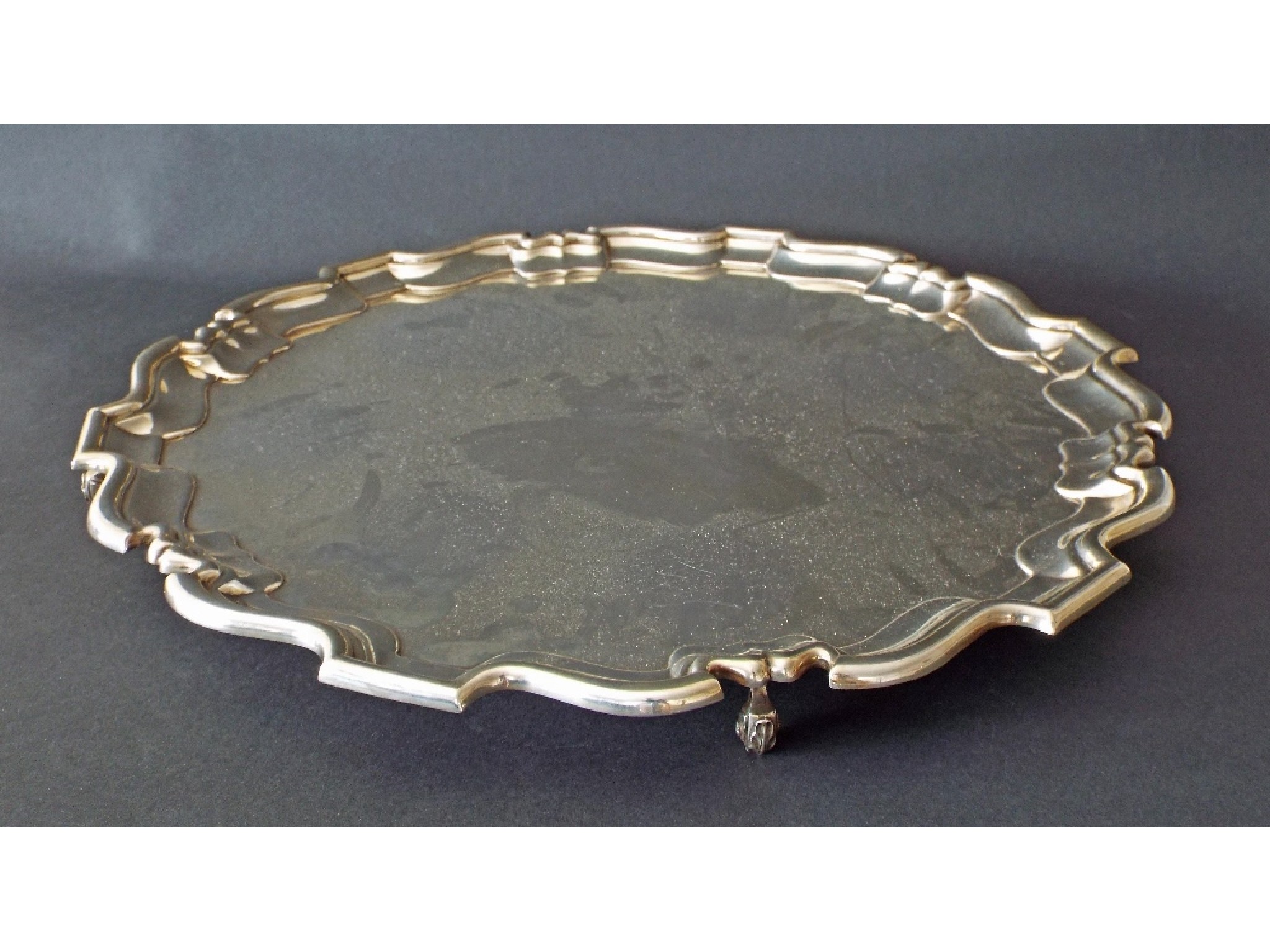 Appraisal: Large silver salver in the Georgian style with a pie-crust