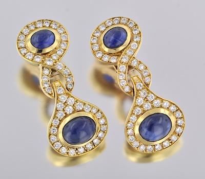 Appraisal: A Pair of Elegant Diamond and Sapphire Earclips k yellow