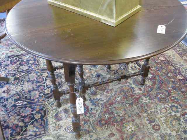 Appraisal: Mahogany Gateleg Table '' diameter '' tall