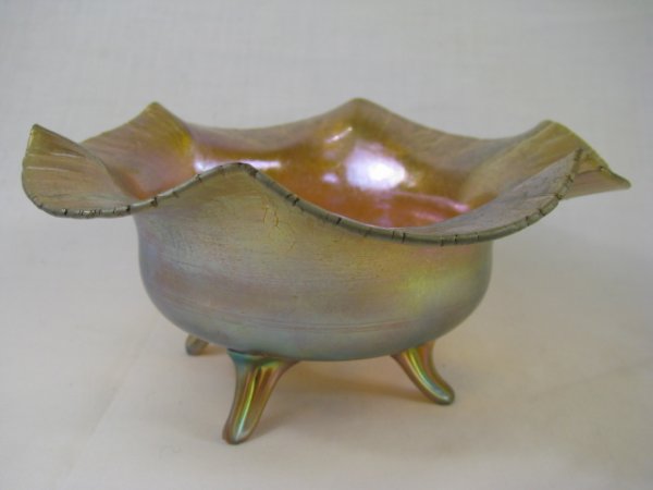 Appraisal: Steuben iridescent gold Aurene glass footed ruffled edge bowl Etched