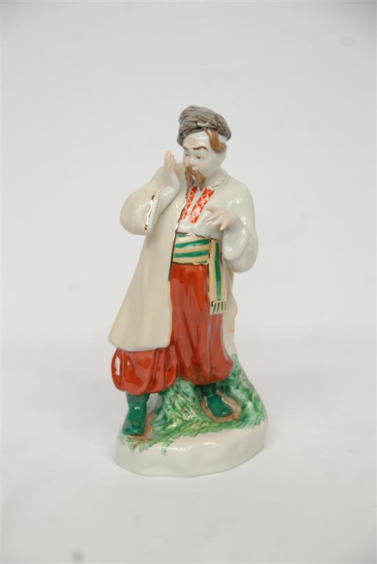 Appraisal: RUSSIAN PORCELAIN FIGURE Man in traditional dress H