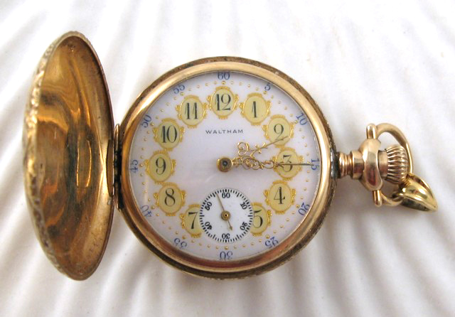 Appraisal: FOURTEEN KARAT GOLD HUNTER CASE POCKET WATCH American Waltham Watch