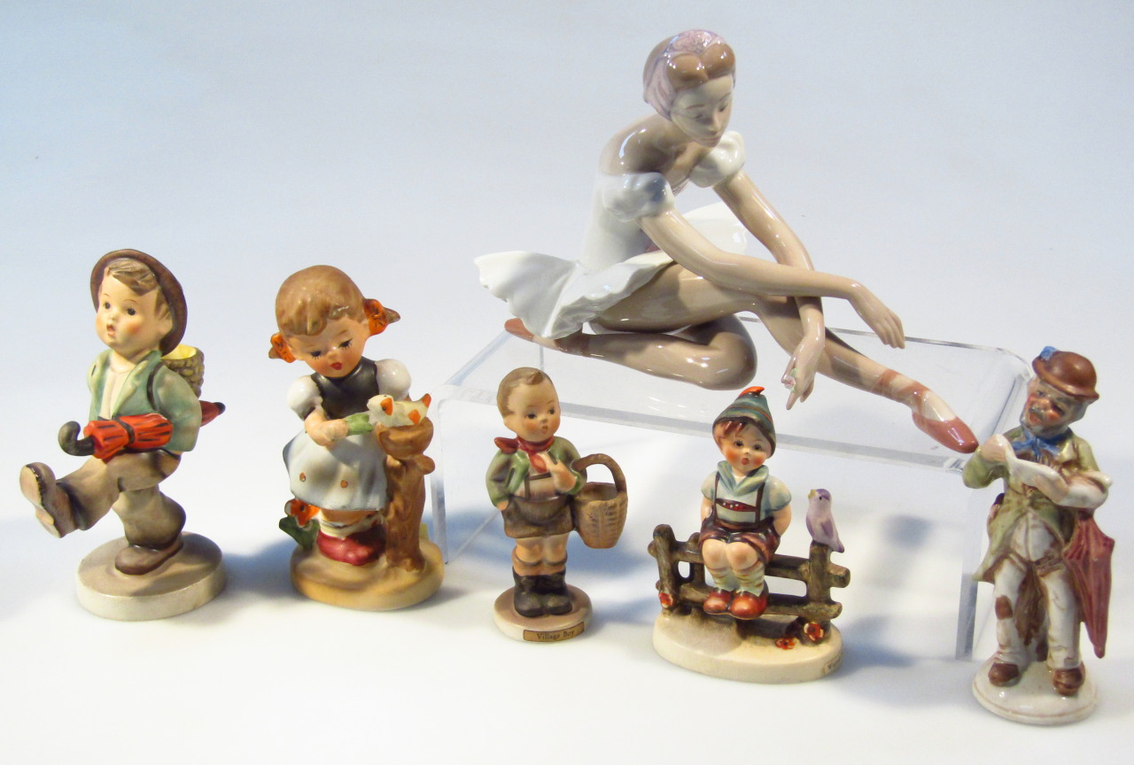 Appraisal: Various Goebel Hummel figures to include Globe Trotter cm high