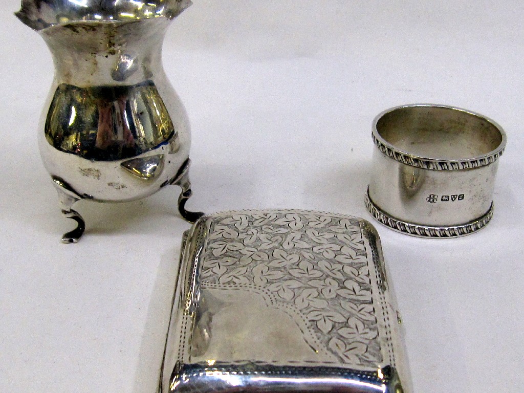 Appraisal: Lot comprising silver cream jug silver cigarette case and a