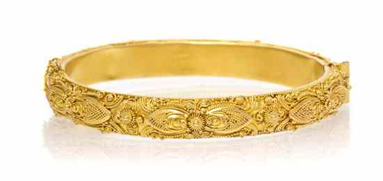 Appraisal: A Karat Yellow Gold Textured Bangle Bracelet with intricate cannetille