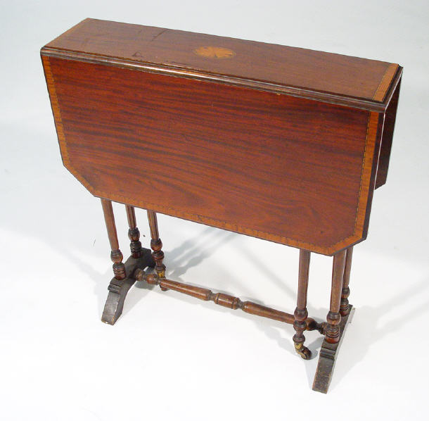 Appraisal: Victorian inlaid mahogany Sutherland table on spindle turned legs stands