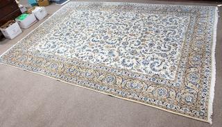 Appraisal: Persian Isfahan carpet Persian Isfahan carpet having all over floral