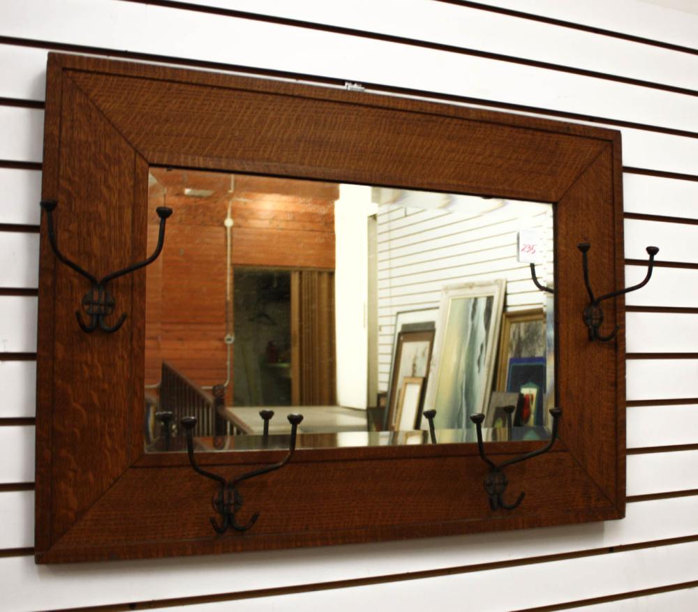 Appraisal: RECTANGULAR OAK-FRAMED GARMENT RACK WALL MIRROR American c x inches