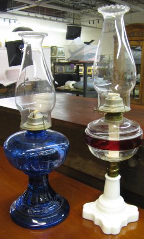 Appraisal: Two antique oil lamps including cobalt glass base oil lamp