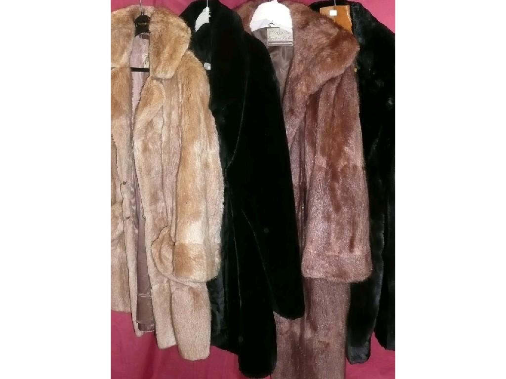 Appraisal: Two Canadian Fur Company coats plus fur and fun fur