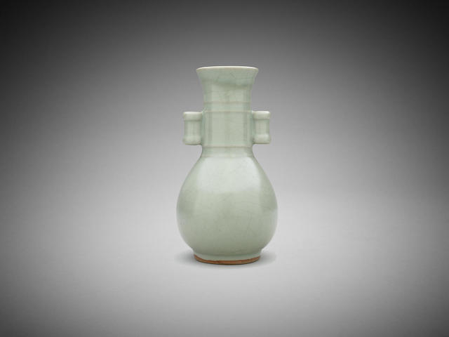 Appraisal: A Chinese celadon-glaze vase with tubular handles Label Bonhams and