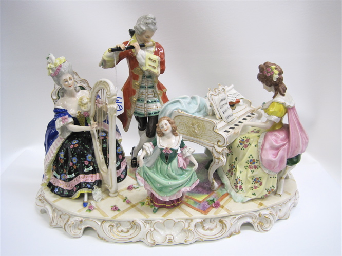 Appraisal: GERMAN PORCELAIN FIGURAL GROUP depicting three musicians playing instruments and