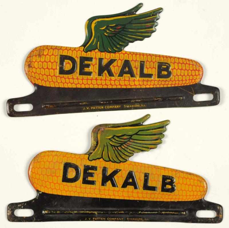 Appraisal: Lot of Dekalb License Plate Toppers Soiled and scratches Condition