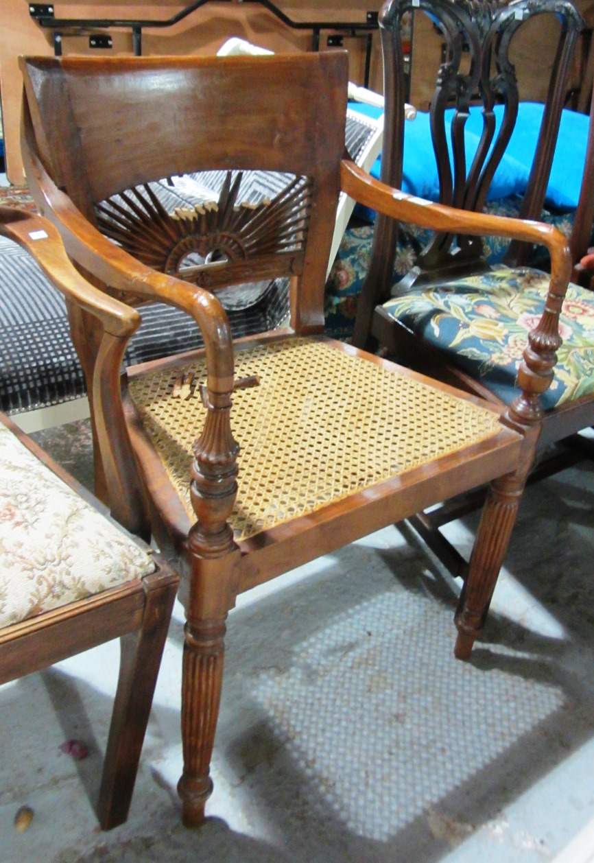 Appraisal: A th century hardwood open armchair