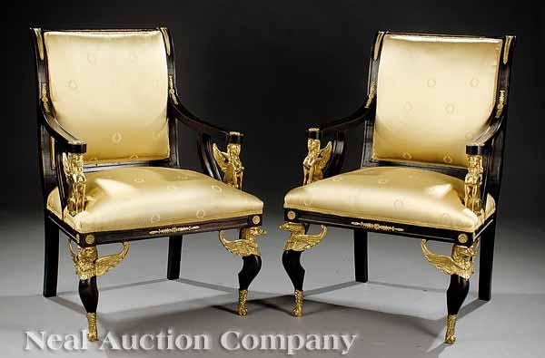 Appraisal: A Pair of Empire-Style Bronze-Mounted Mahogany Fauteuils molded rectangular back