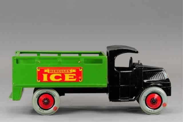 Appraisal: CHEIN HERCULES BOXED ICE TRUCK Lithographed tin black Mack 'C'