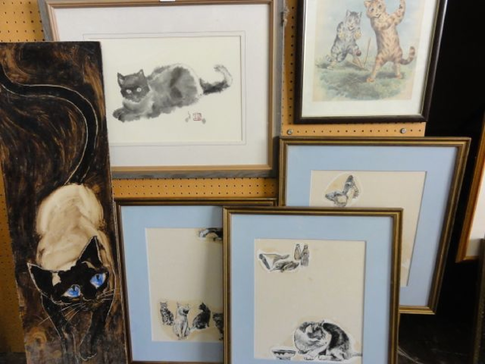 Appraisal: A collection of illustrations relating to cats including a set