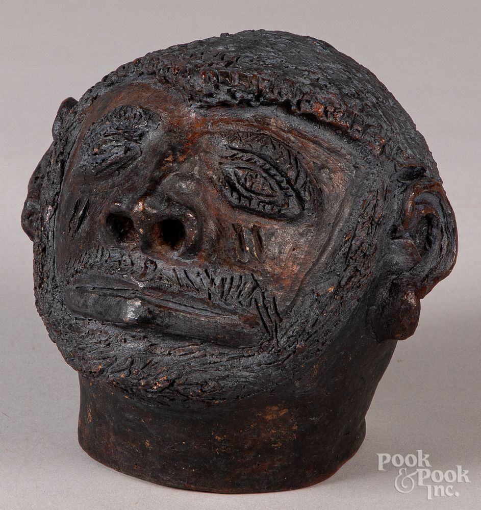 Appraisal: Redware head of a African American man Redware head of