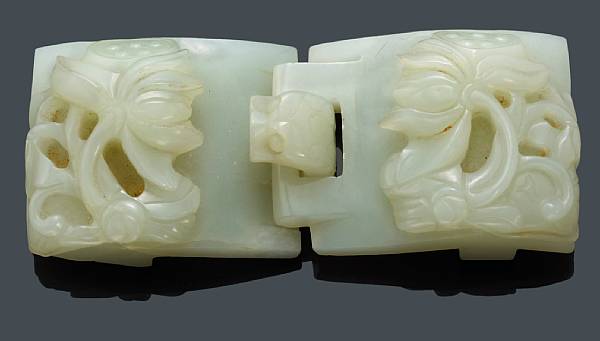 Appraisal: A carved nephrite two-part belt buckle Each section of curving