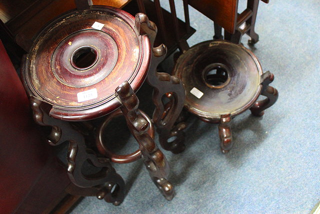 Appraisal: A CHINESE HARDWOOD PLANT STAND with circular top and five