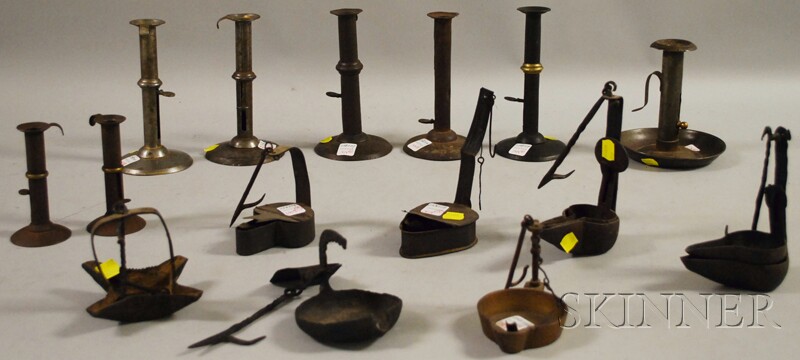 Appraisal: Seven Wrought Iron and Metal Grease Lamps Seven Iron and