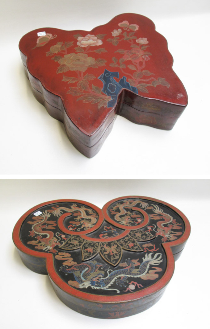 Appraisal: TWO CHINESE LACQUERED BOXES each with black interiors a trifolium-form