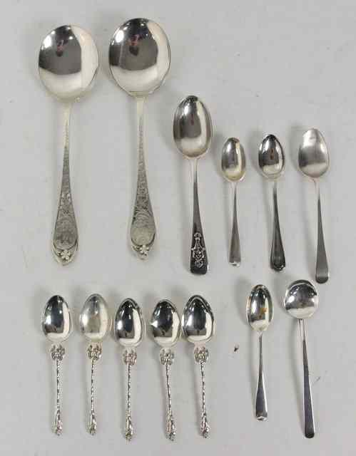 Appraisal: A pair of silver spoons with pierced stems Sheffield five