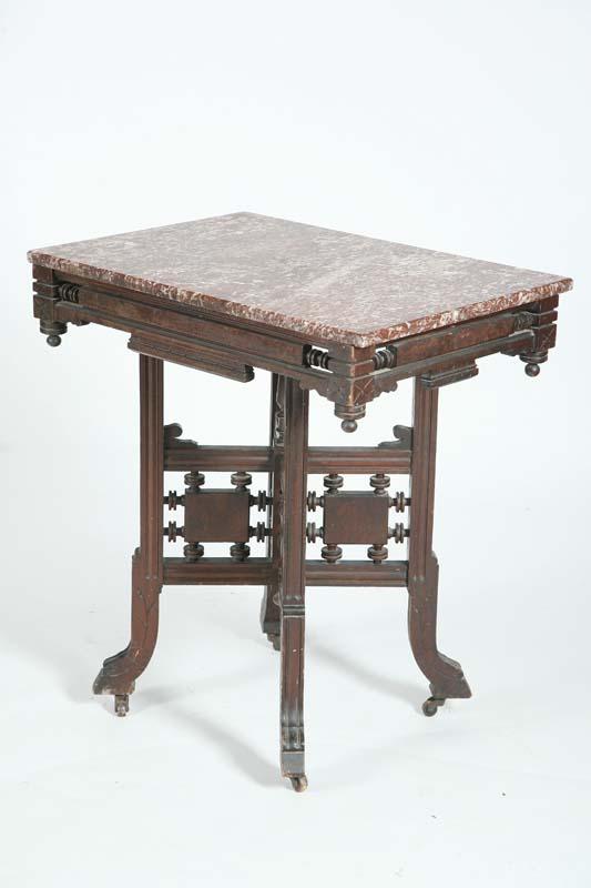 Appraisal: VICTORIAN MARBLE TABLE Mottled brown and white marble with drop