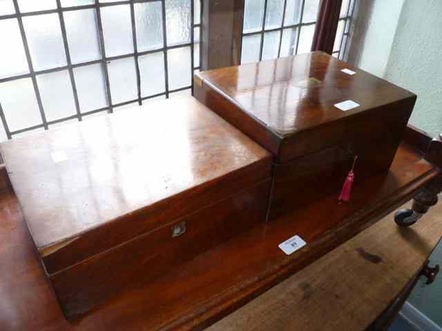 Appraisal: A VICTORIAN WALNUT WRITING SLOPE with fitted interior together with