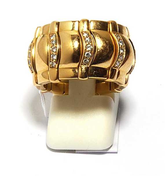 Appraisal: GOLD AND BRILLIANT-CUT DIAMOND RING PIAGET Ros gold Casual-elegant broad