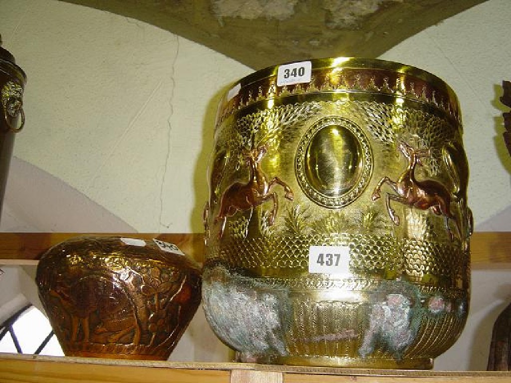 Appraisal: A copper and brass coal bucket decorated with prancing deer