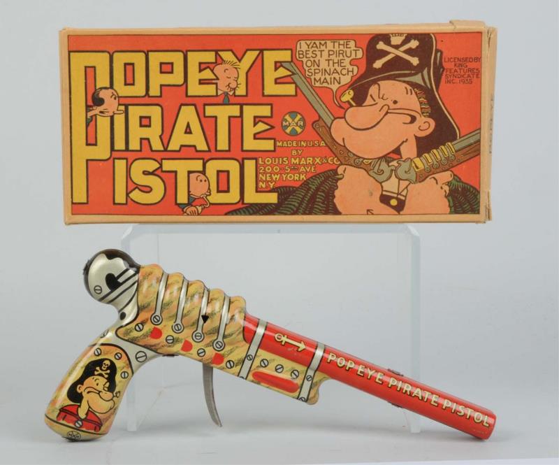 Appraisal: Marx Tin Litho Popeye Clicker Pirate Pistol Nice litho characters