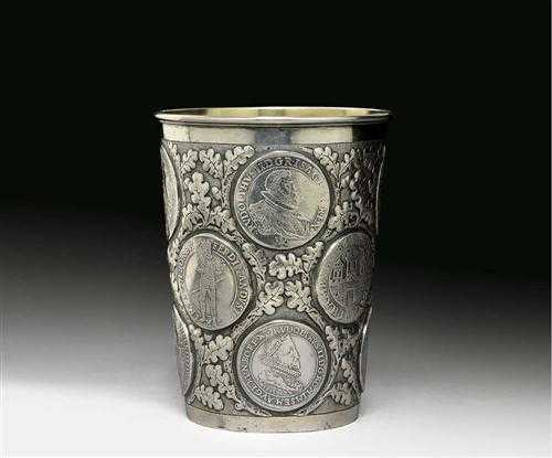 Appraisal: BEAKER WITH COINS No mark Probably th century Coins set